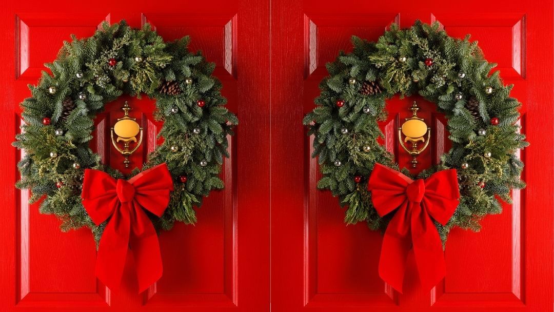 red doors with wreaths